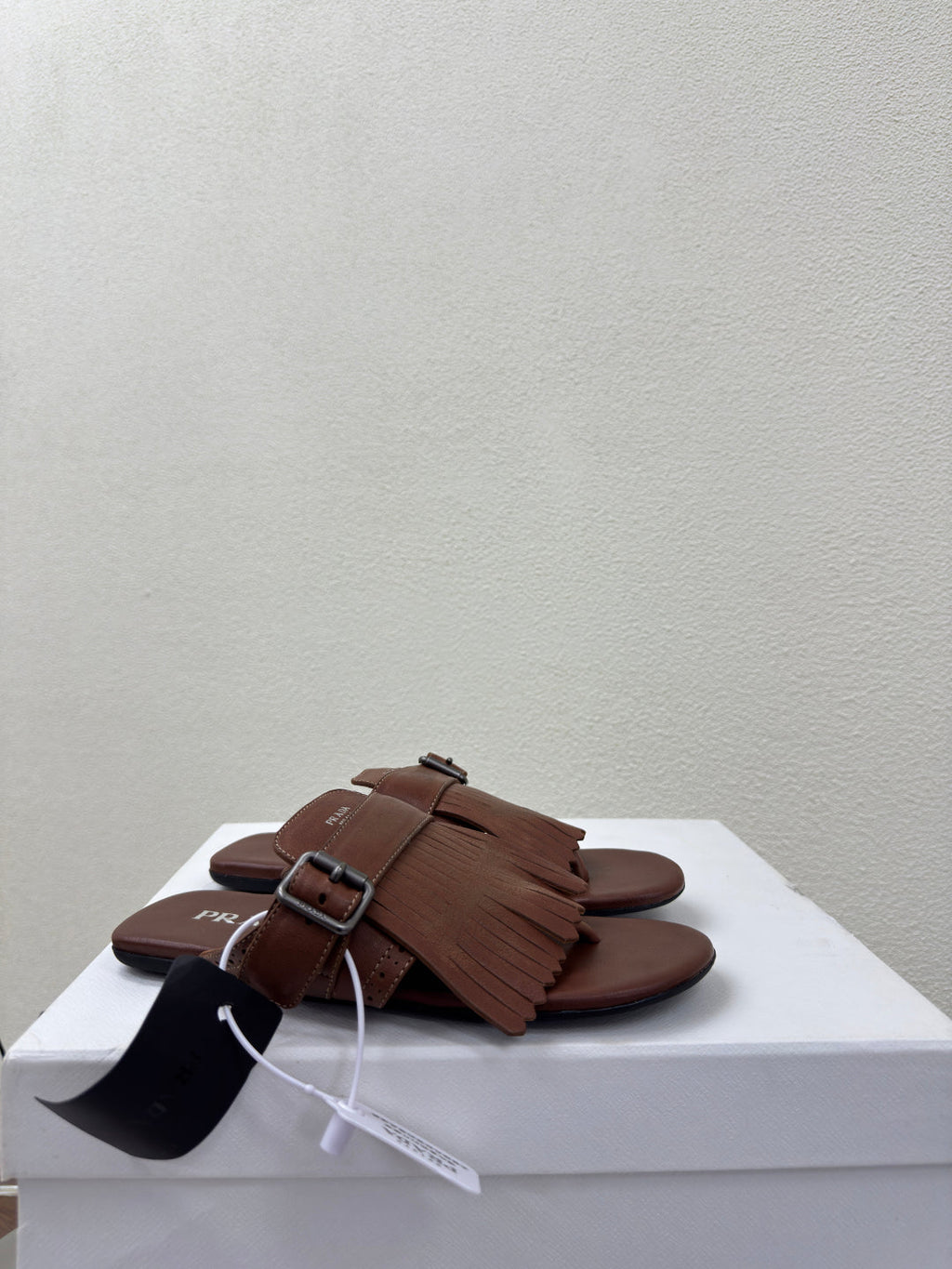PRADA 25S SHUFFLE LEATHER THONG SANLS IN SIENNA CALFSKIN