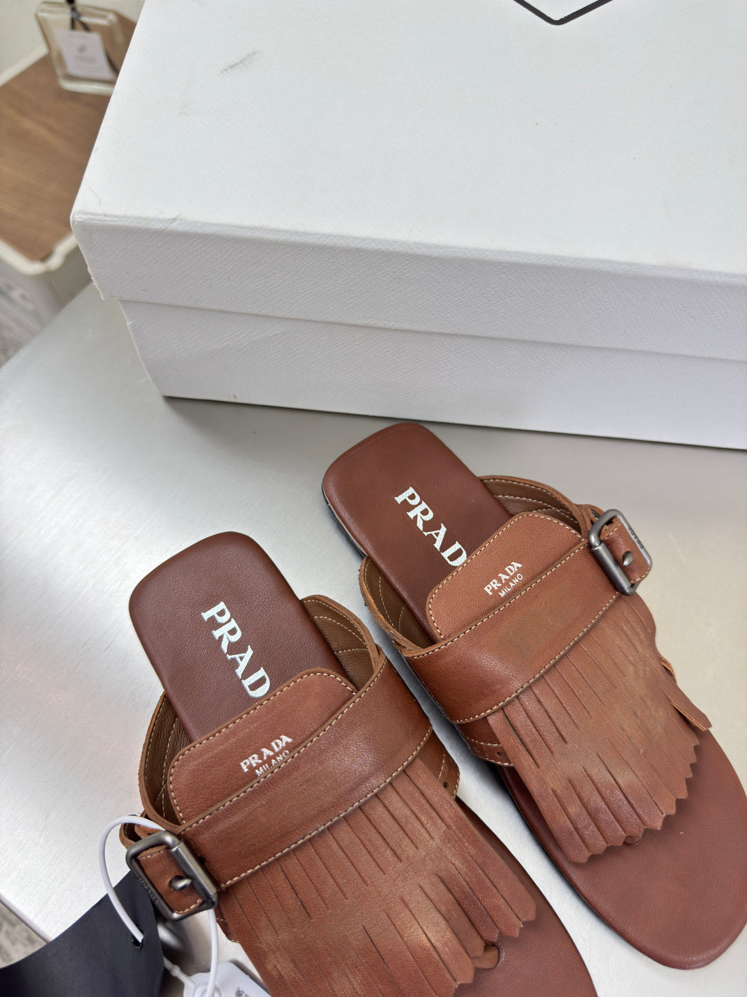 PRADA 25S SHUFFLE LEATHER THONG SANLS IN SIENNA CALFSKIN