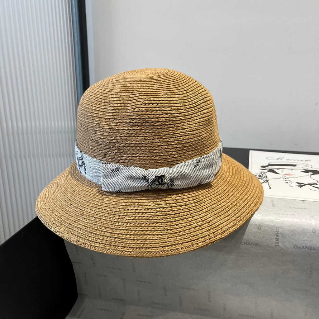 CHANEL STRAW BUCKET HAT IN BROWN WITH RIBBON BOW 673978