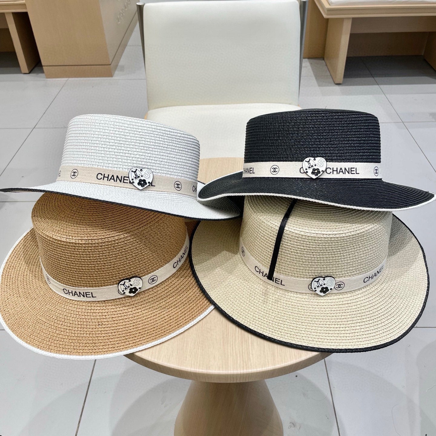 CHANEL FLAT STRAW HAT BLACK 672722