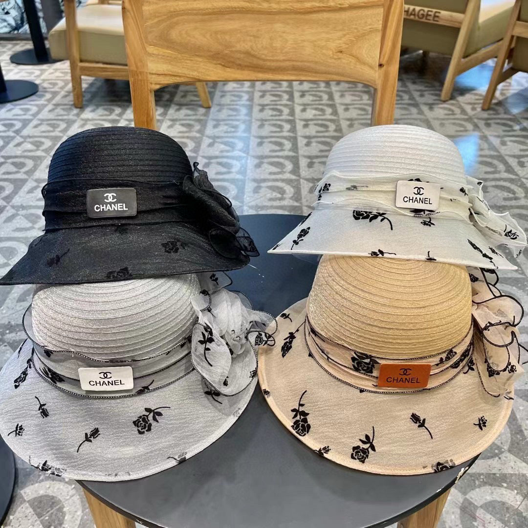 CHANEL STRAW HAT WITH CHIFFON FLOWER VINTAGE GRAY 672759
