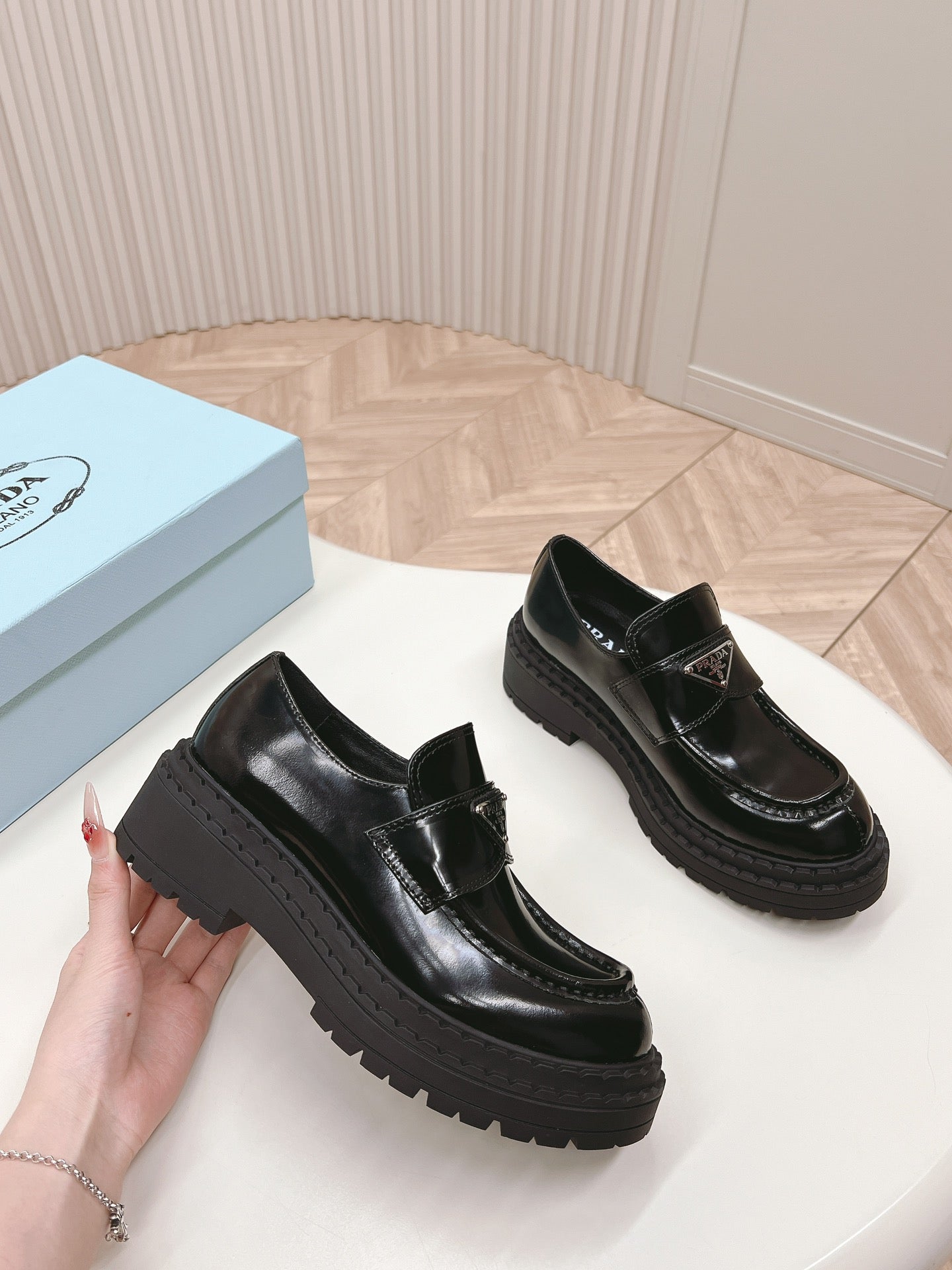 PRADA BRUSHED MONOLITH LOAFERS GLOSSY BLACK CALFSKIN