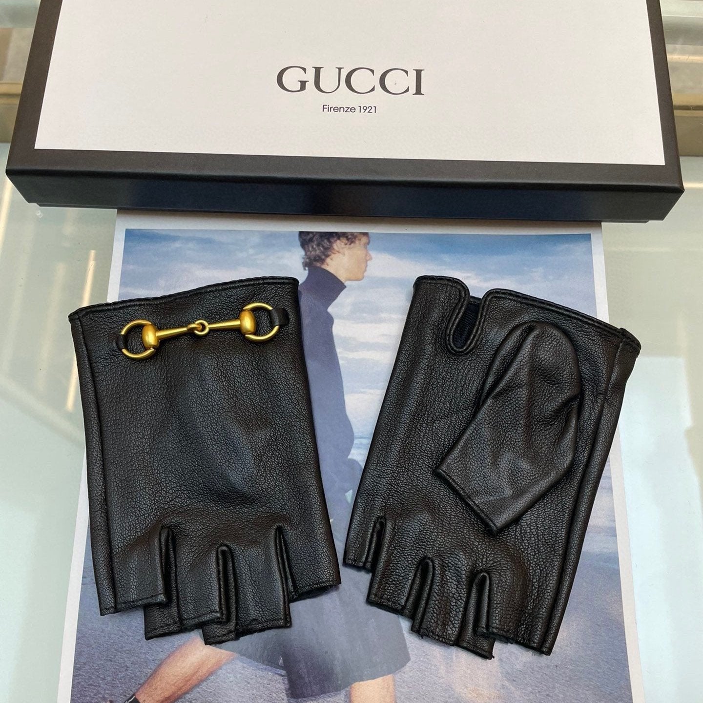 GUCCI FINGERLESS GLOVES IN BLACK LAMBSKIN WITH GOLD HORSEBIT 432606
