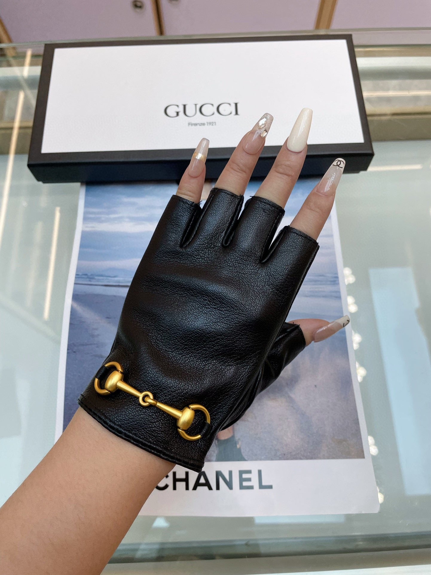 GUCCI FINGERLESS GLOVES IN BLACK LAMBSKIN WITH GOLD HORSEBIT 432606