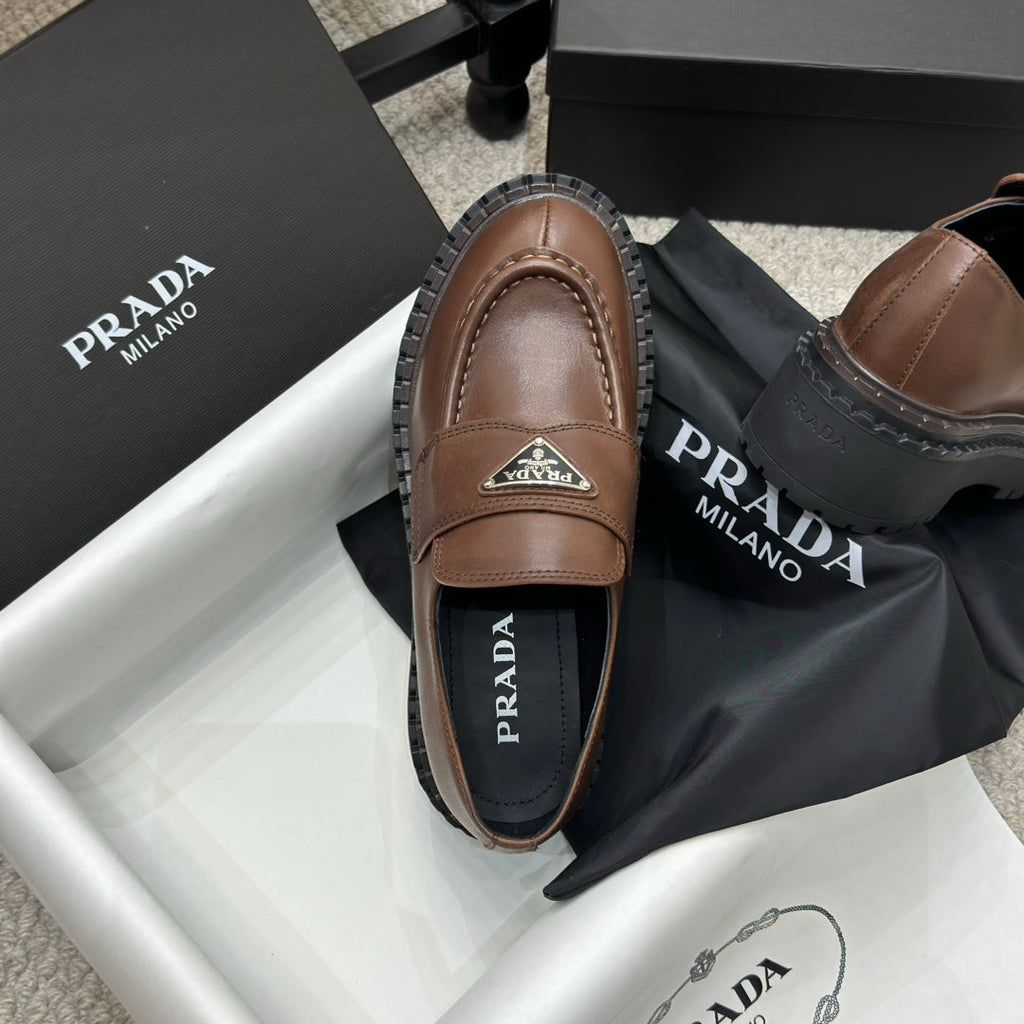 PRADA 25S LOAFER 50MM IN RK BROWN CALFSKIN LOGO