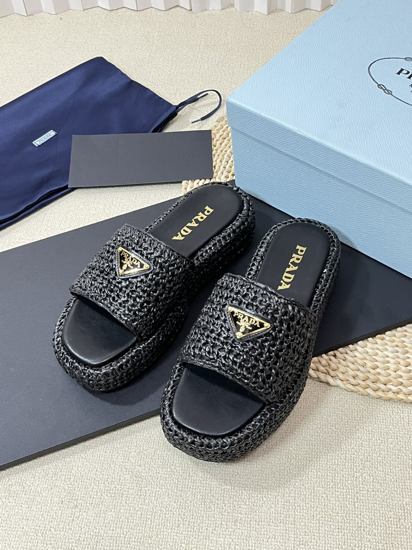PRADA CROCHET FLATFORM SLIDES BLACK RAFFIA