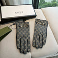 GUCCI HORSEBIT GLOVES IN STONE BLUE MONOGRAM JACQUARD FABRIC MIX BLACK SHEEPSKIN 456333
