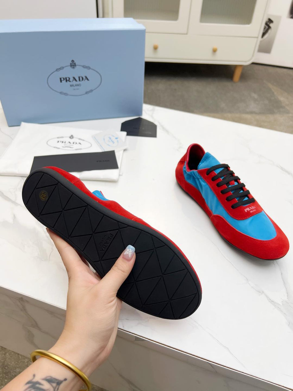 PRADA COLLAPSE SNEAKERS IN RED SUEDE AND SKY BLUE NYLON