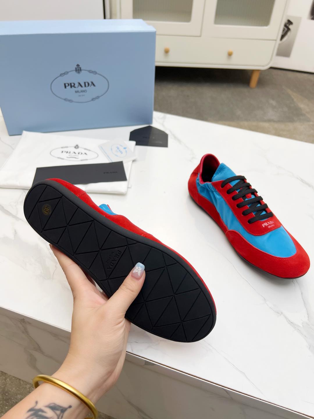 PRADA COLLAPSE SNEAKERS IN RED SUEDE AND SKY BLUE NYLON