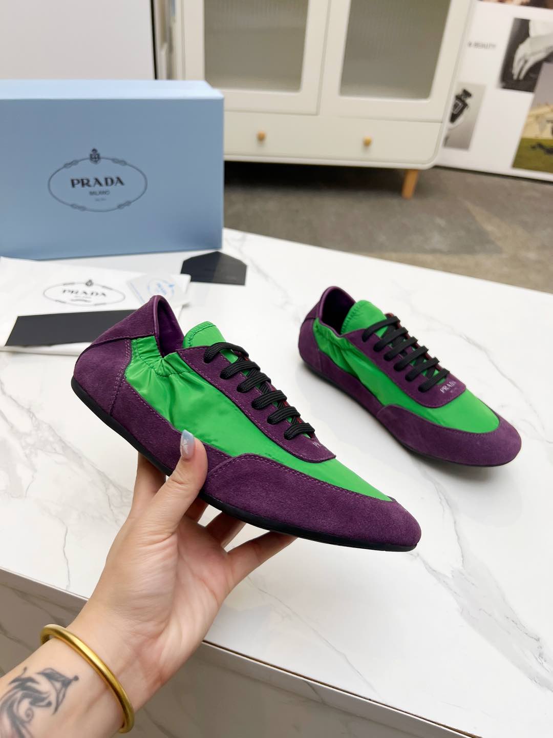 PRADA COLLAPSE SNEAKERS IN PURPLE SUEDE AND GREEN NYLON
