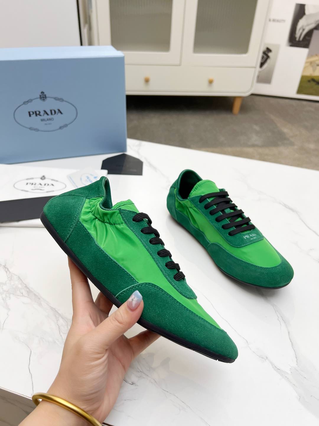 PRADA COLLAPSE SNEAKERS IN GREEN SUEDE AND NYLON