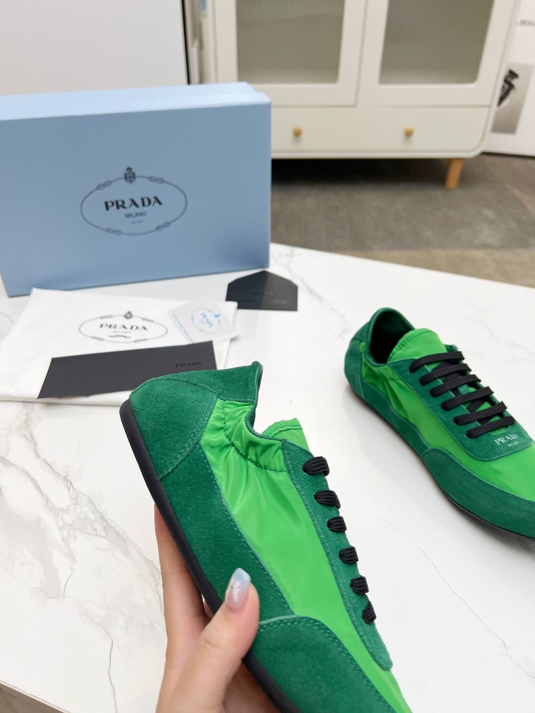 PRADA COLLAPSE SNEAKERS IN GREEN SUEDE AND NYLON