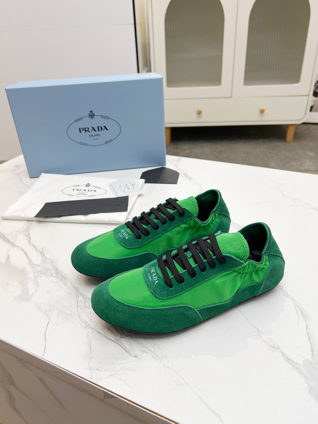PRADA COLLAPSE SNEAKERS IN GREEN SUEDE AND NYLON