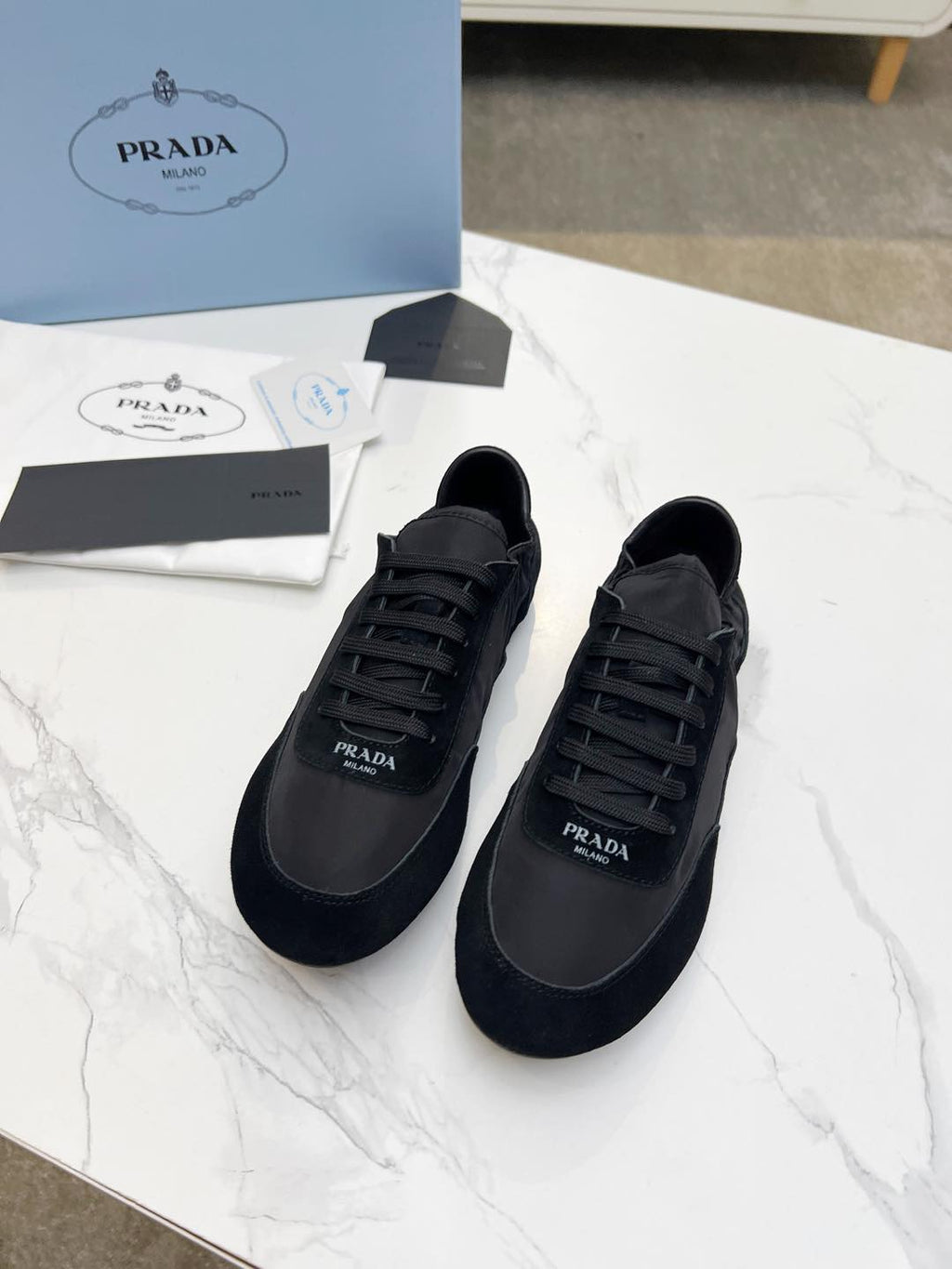 PRADA COLLAPSE SNEAKERS IN BLACK SUEDE AND NYLON