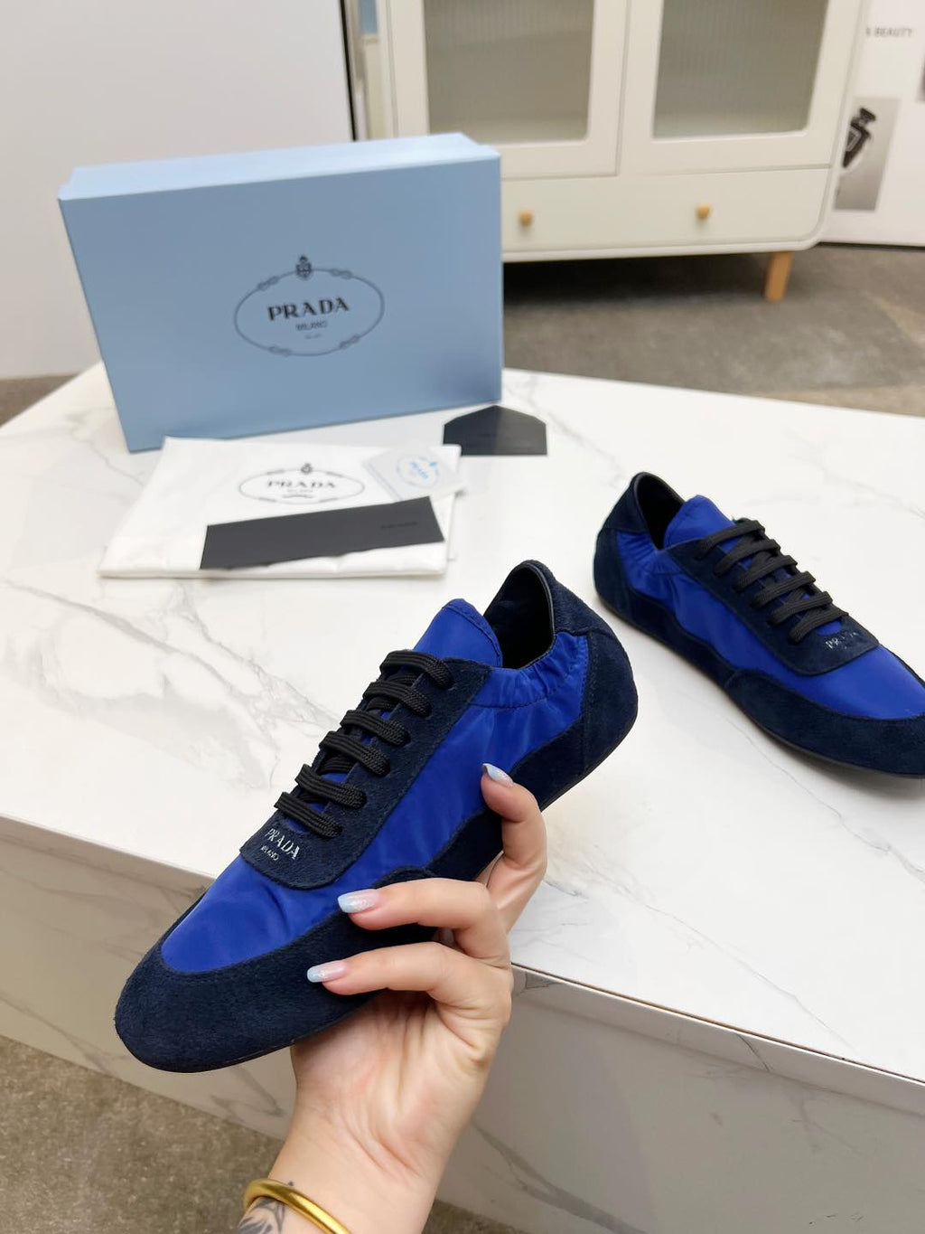 PRADA COLLAPSE SNEAKERS IN BLUE SUEDE AND NYLON