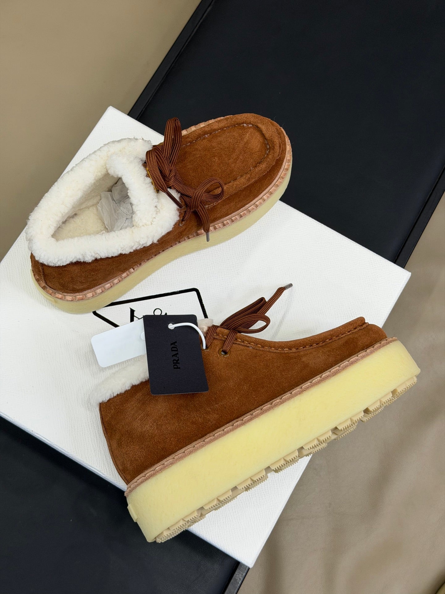 PRADA 25S HIGH-TOP SHOES 40 MM IN RK BROWN SUEDE SHEARLING-LINED