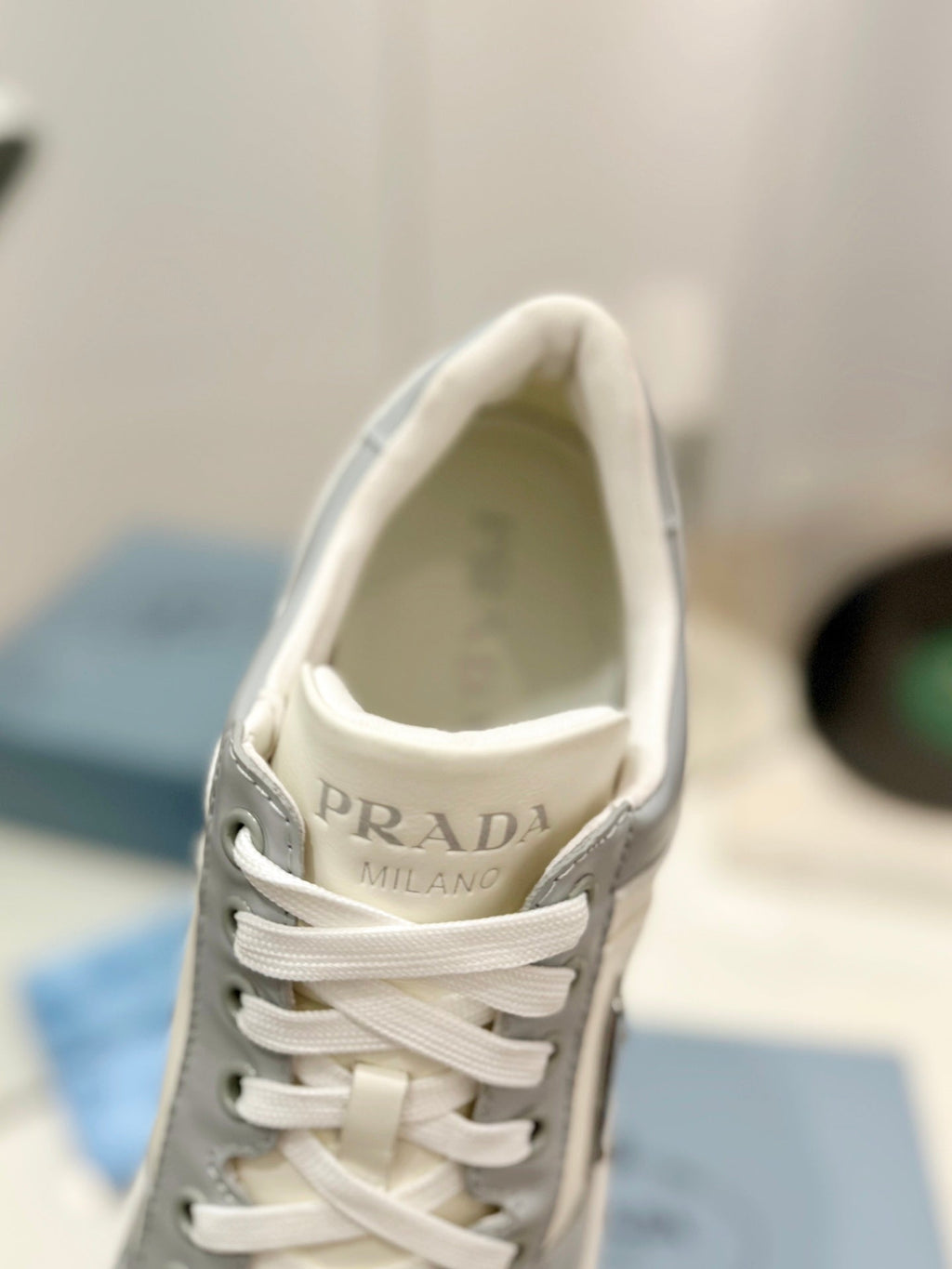 PRADA DOWNTOWN PERFORATED SNEAKERS WHITE AND GRAY CALFSKIN