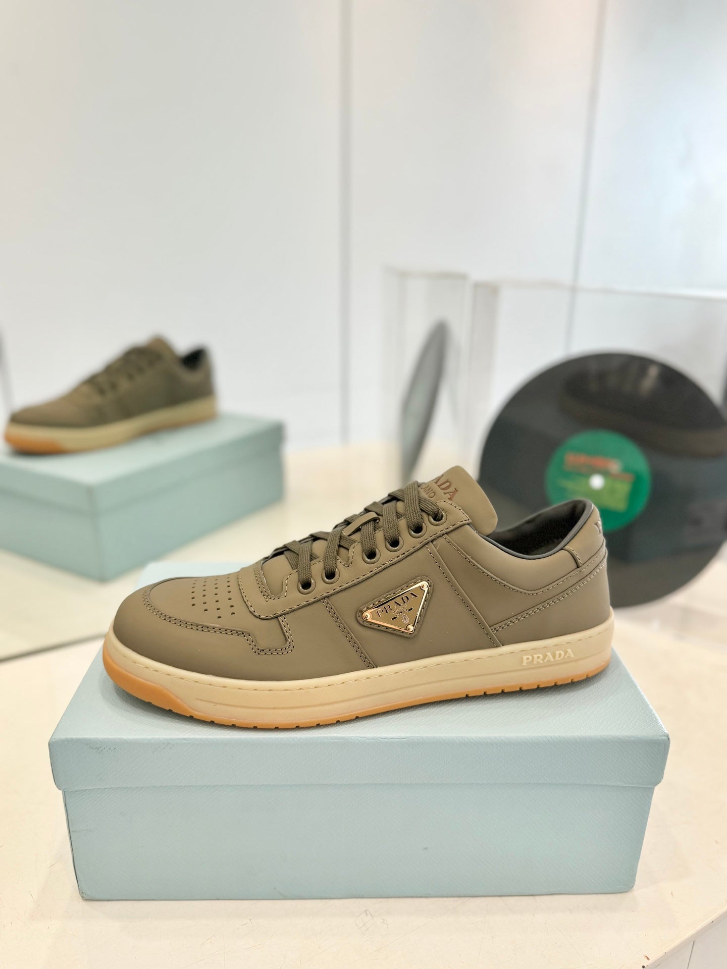 PRADA DOWNTOWN PERFORATED SNEAKERS OLIVE CALFSKIN