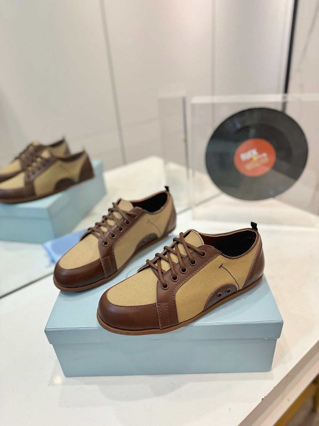 PRADA SNEAKERS IN BROWN LAMBSKIN AND BEIGE CANVAS